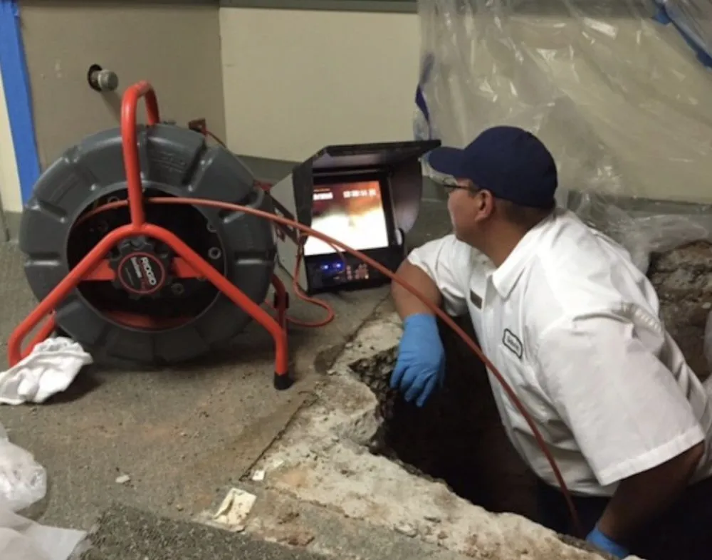 Slide of Rapid Rooter Drain Master & Plumbing Experts