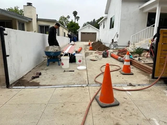 Slide of Red Lilly Plumbing & Rooter