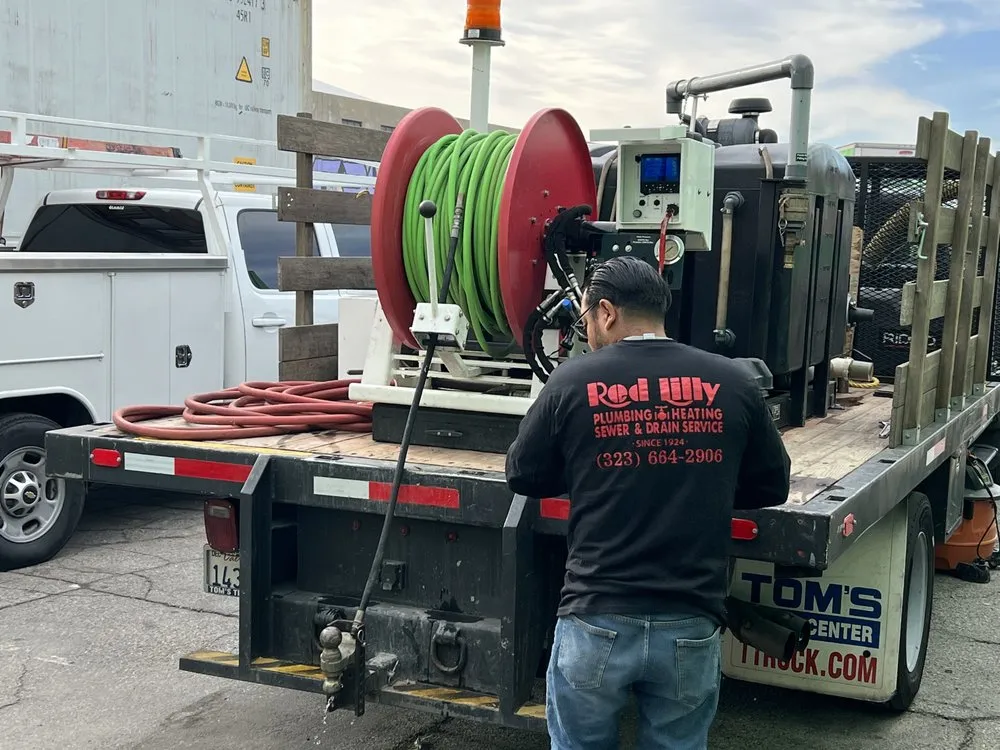 Slide of Red Lilly Plumbing & Rooter