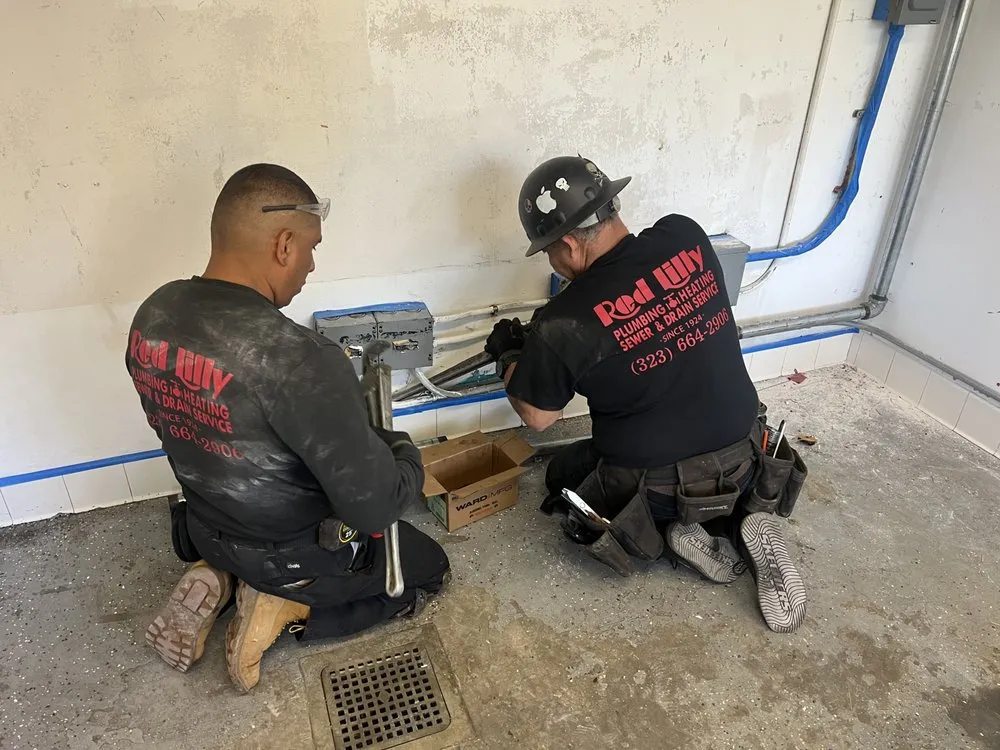 Slide of Red Lilly Plumbing & Rooter