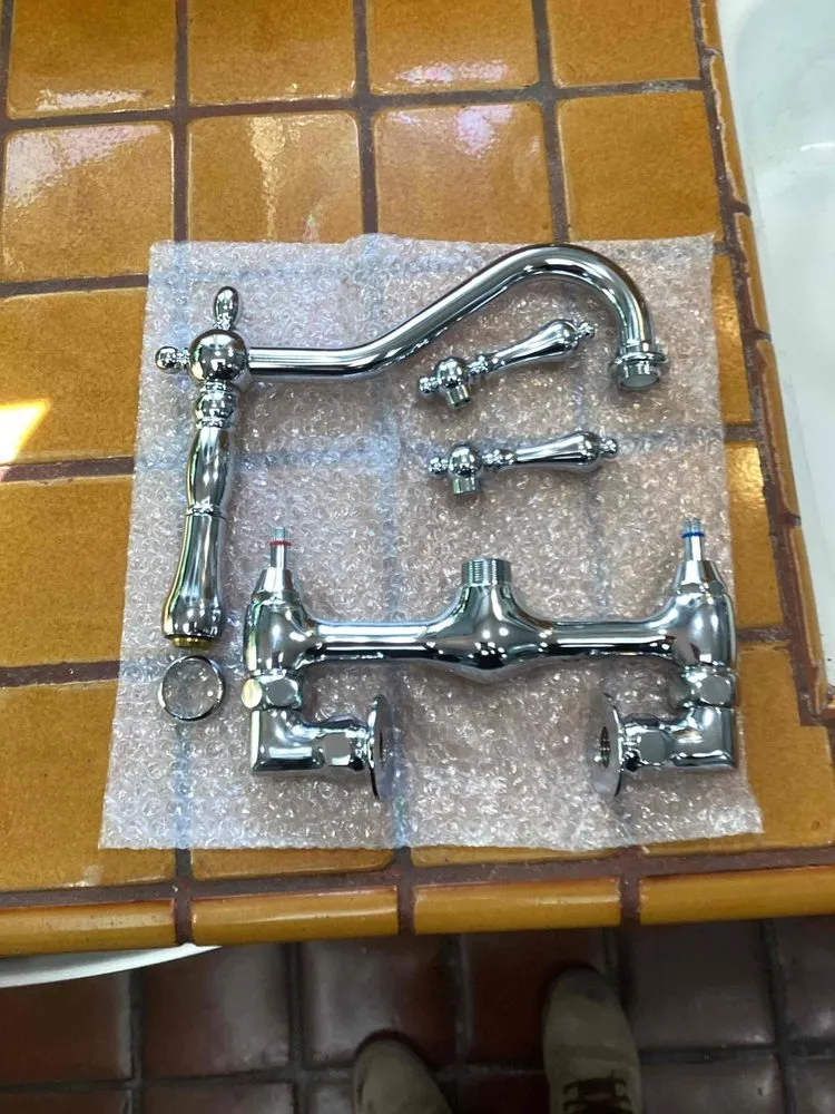 Slide of Red Lilly Plumbing & Rooter