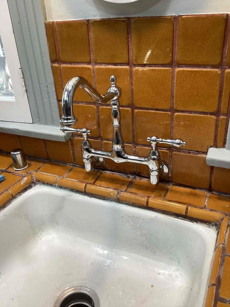 Slide of Red Lilly Plumbing & Rooter