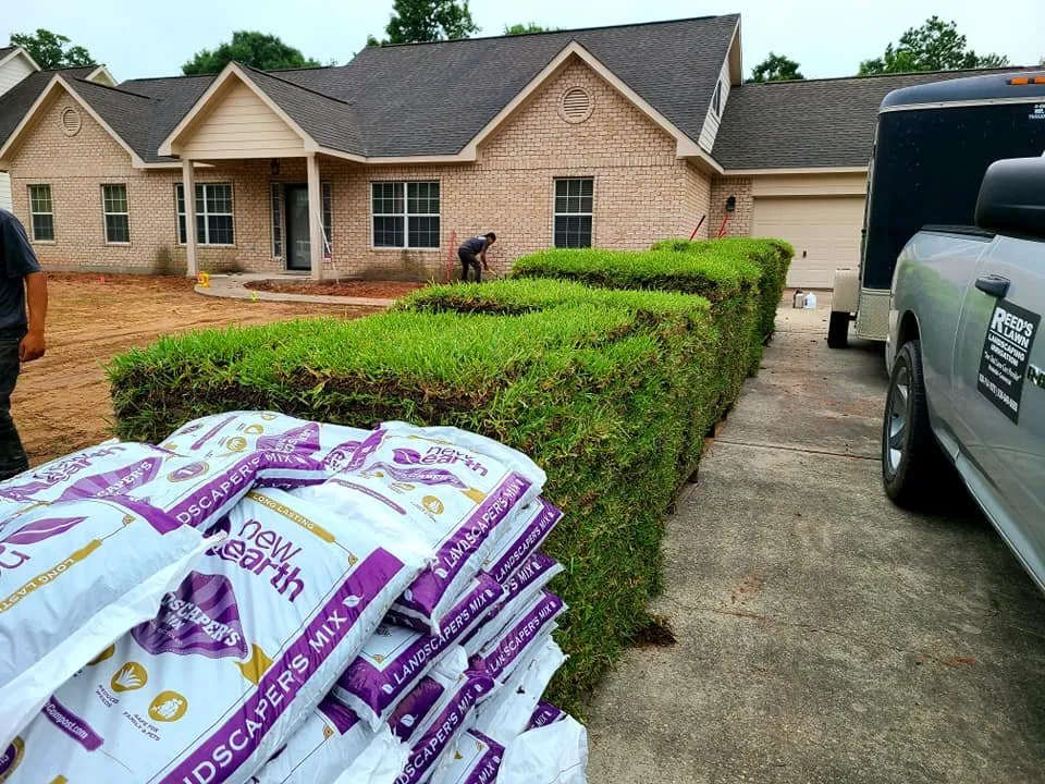 Slide of Reed's Lawn & Landscaping Services