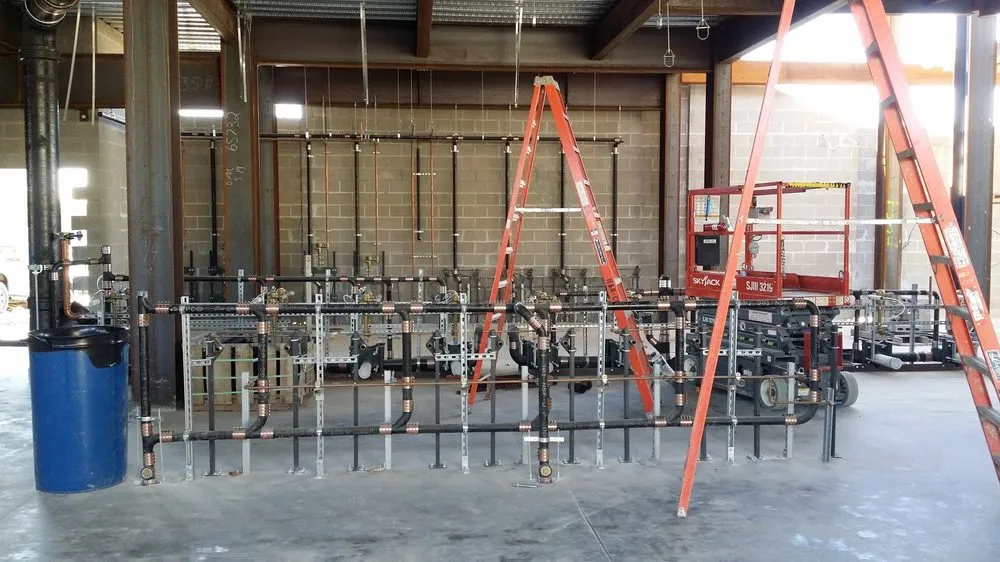 Slide of R.E.I. Plumbing