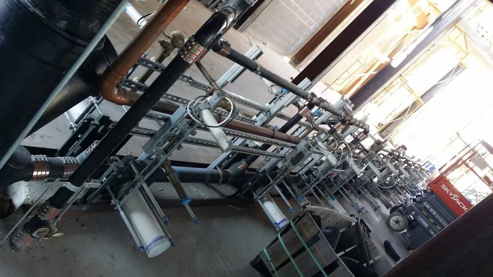 Slide of R.E.I. Plumbing