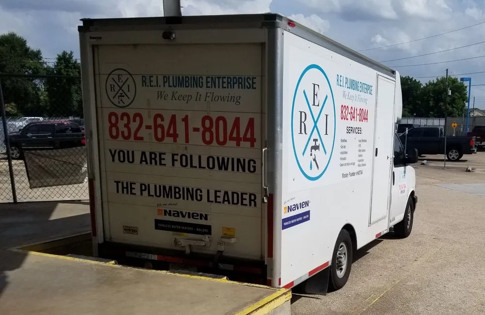 Slide of R.E.I. Plumbing