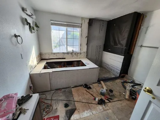 Reliable Plumbing & Flooring Logo