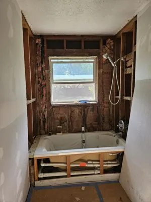 Remodelaciones Marcos Logo