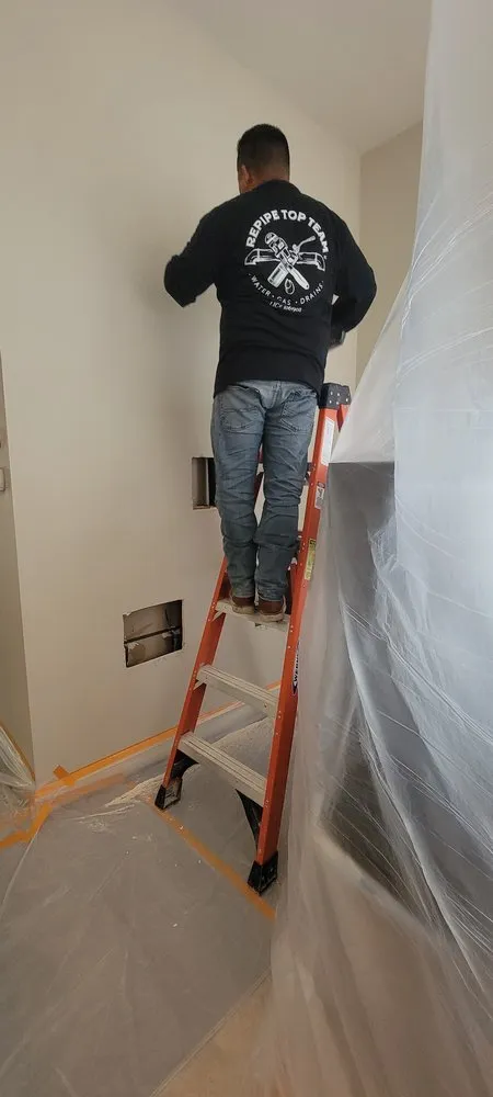 Slide of Repipe Top Team