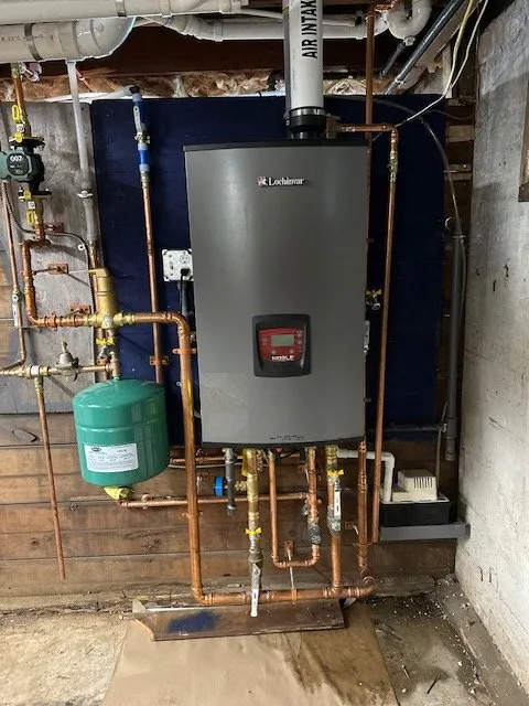 Professional water heater service in Framingham, MA by Revamp Plumbing Solutions