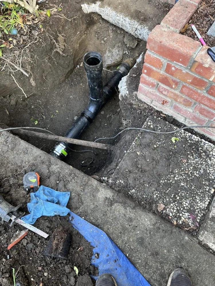 Slide of RF Plumbing & Rooter