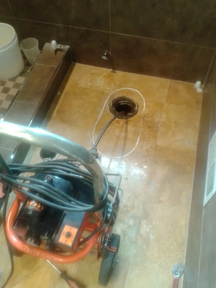 Slide of RF Plumbing & Rooter