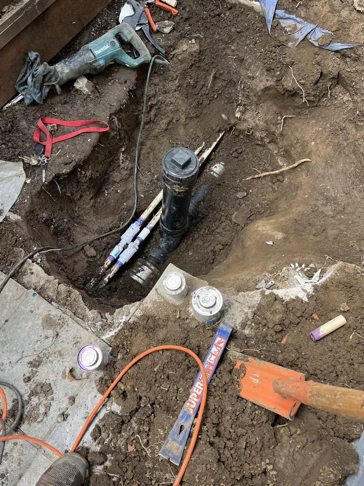 Slide of RF Plumbing & Rooter