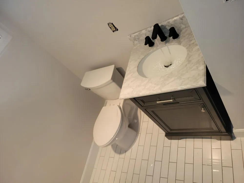 Slide of Rhino Rooter Plumbing Sewer & Drain