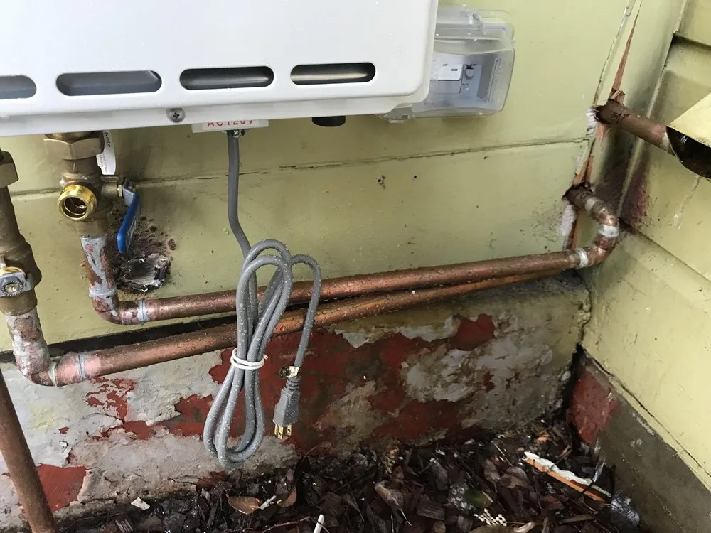 Slide of Rick's Plumbing