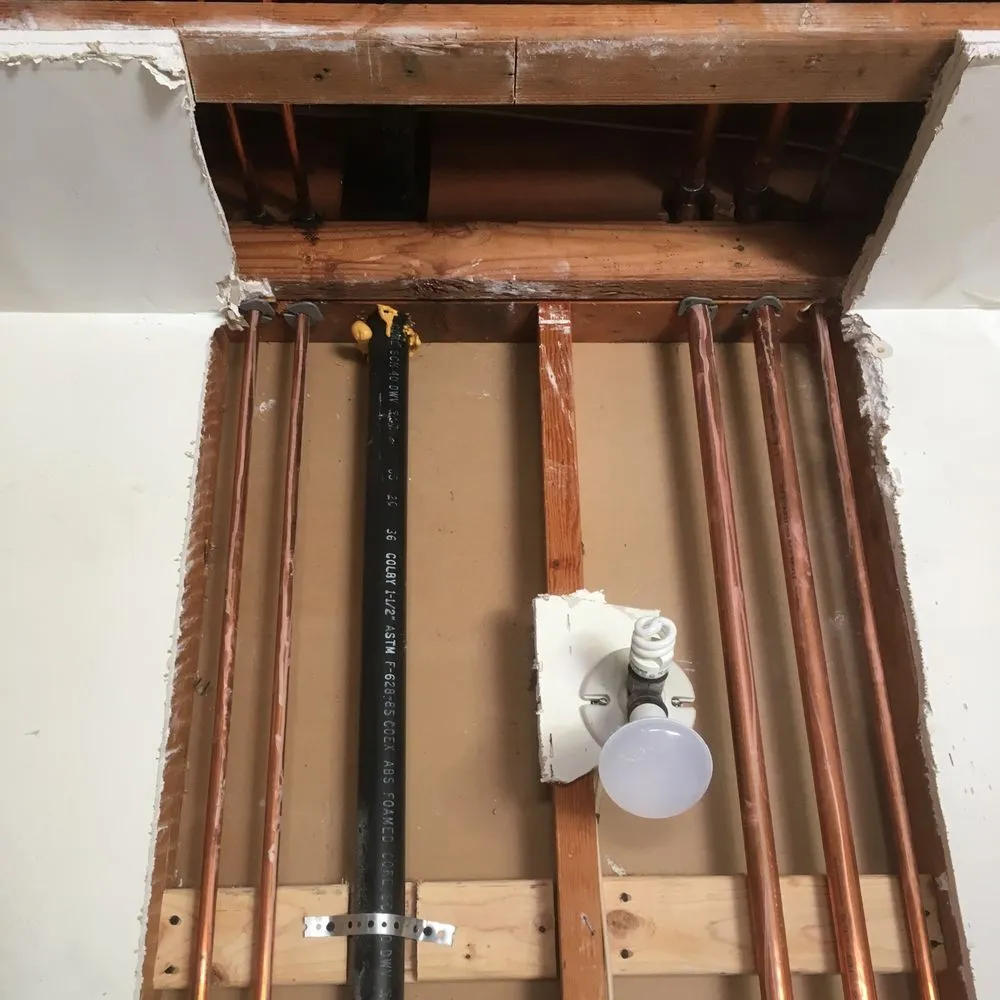 Slide of Rick's Plumbing