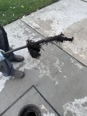 Rick's Sewer & Drainage Inc Logo