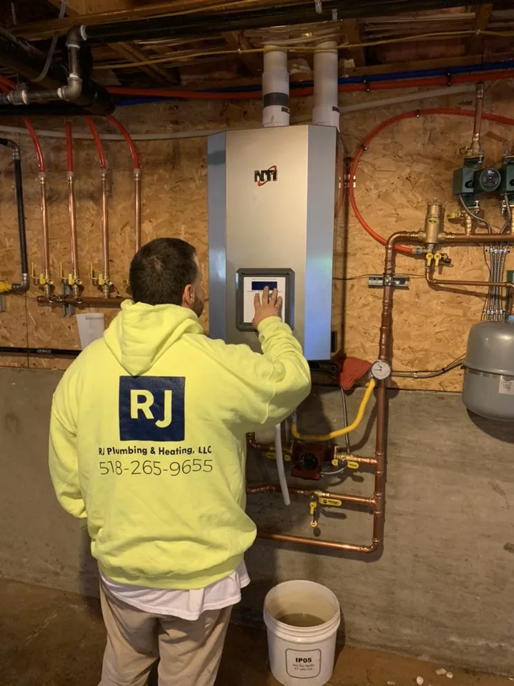 Slide of RJ Plumbing and Heating