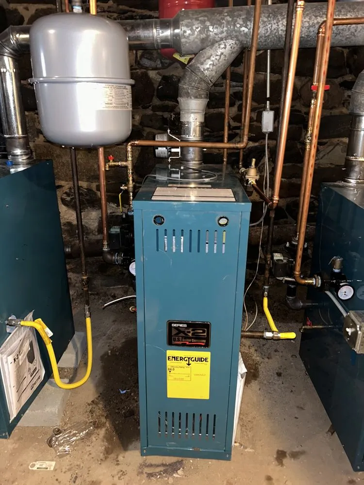 Slide of RJ Spag Plumbing&Heating