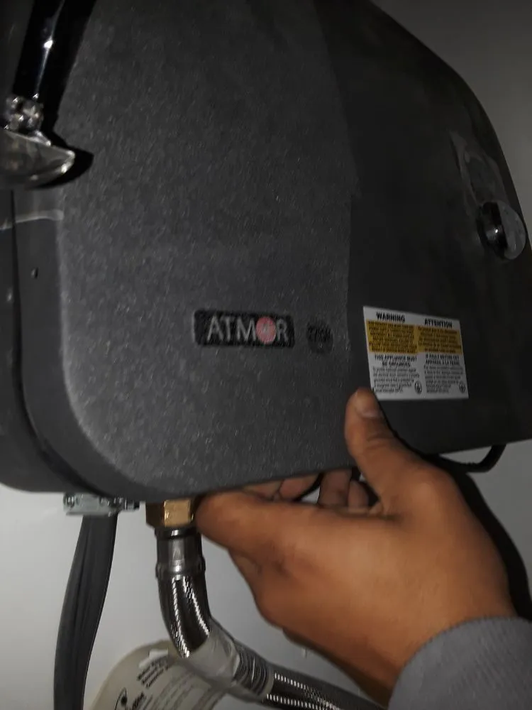 Slide of RNG Plumbing Heating & Air Conditioning