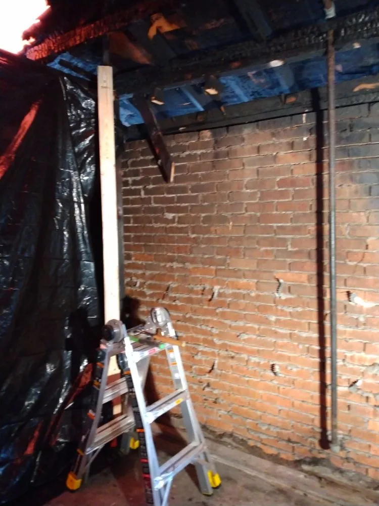 Slide of Robinson's Handymen