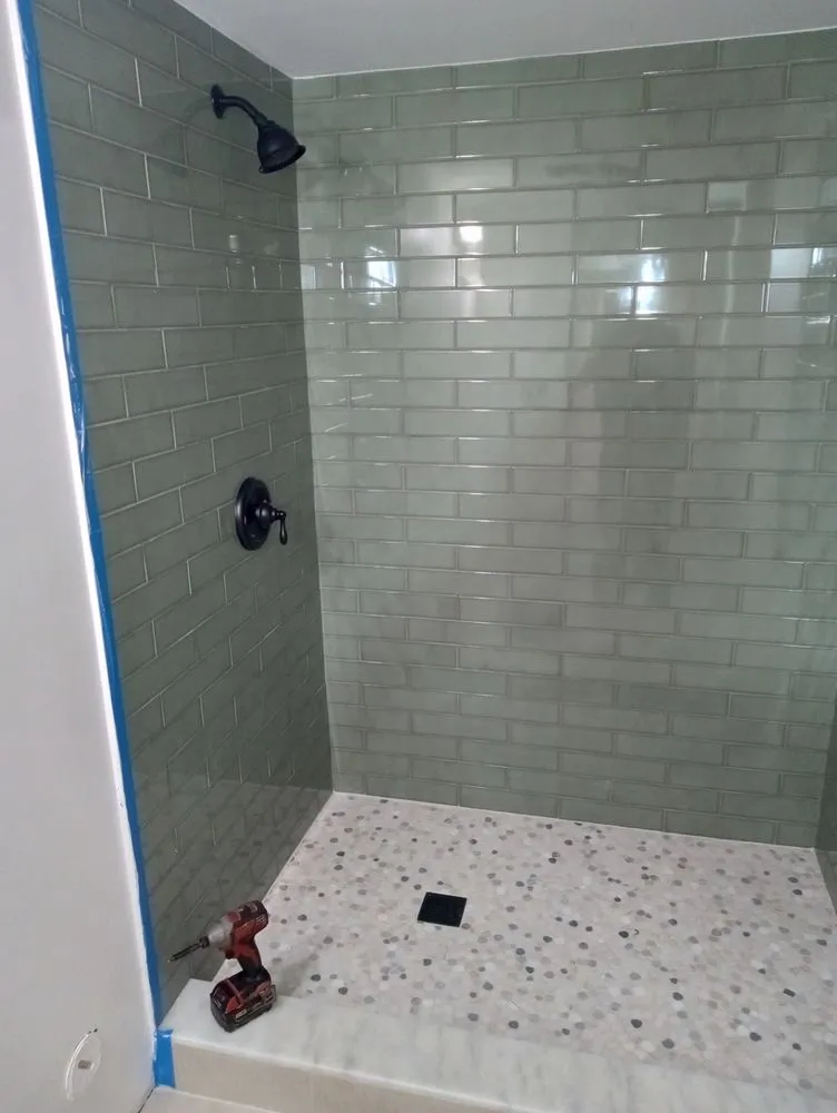 Slide of Rock Rooter Drain service and Plumbing