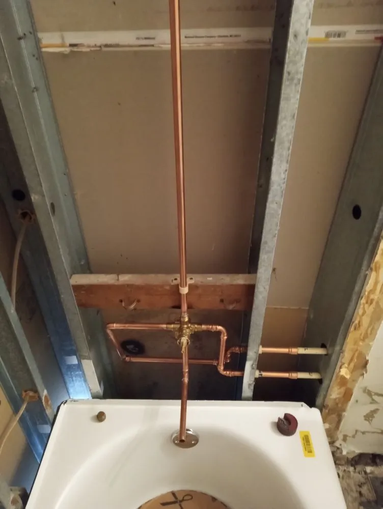 Slide of Rock Rooter Drain service and Plumbing