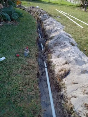 Rock Rooter Drain service and Plumbing Logo