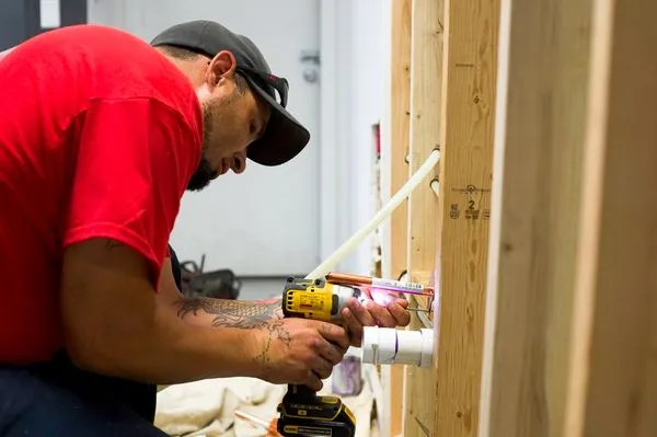 Rocketman Plumbing Logo