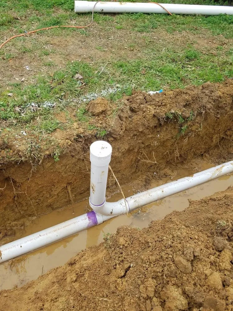 Slide of Rock's Plumbing and Drain Services