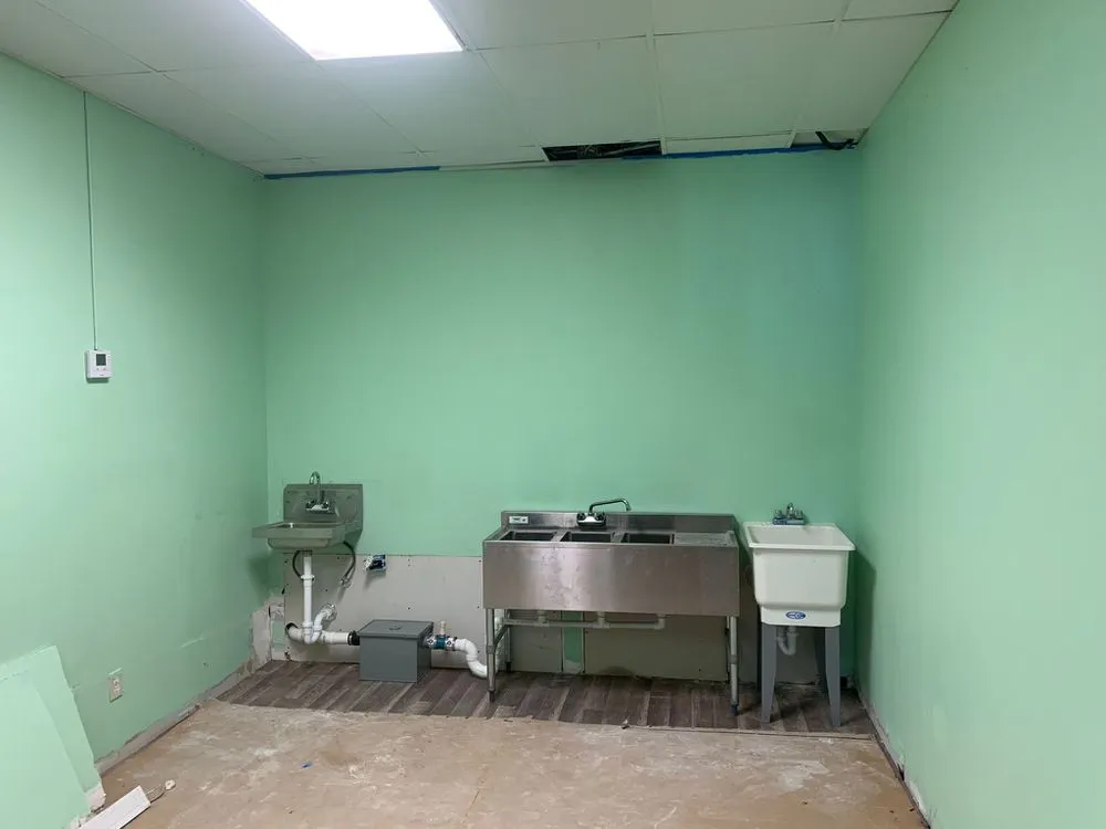 Slide of Rooster Plumbing Service