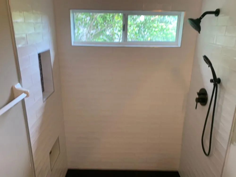 Slide of Rooster Plumbing Service