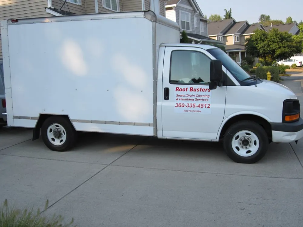 Slide of Root Busters Plumbing and Drain Cleaning