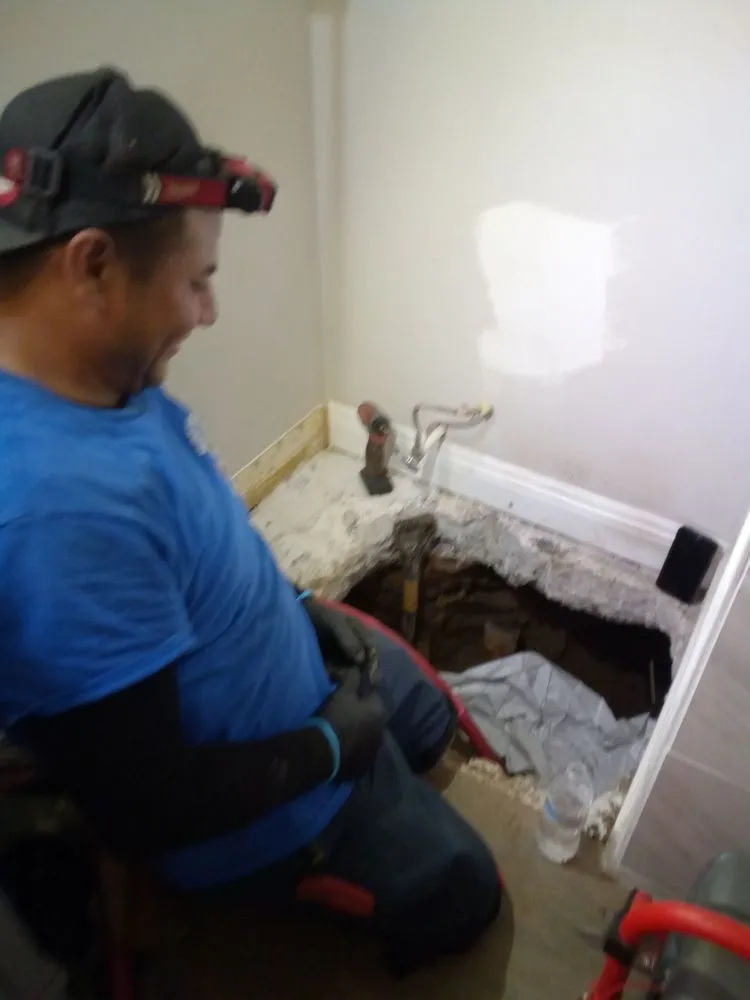 Slide of Rooter John