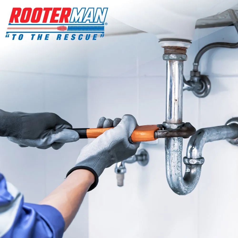 Slide of Rooter Man Plumbers