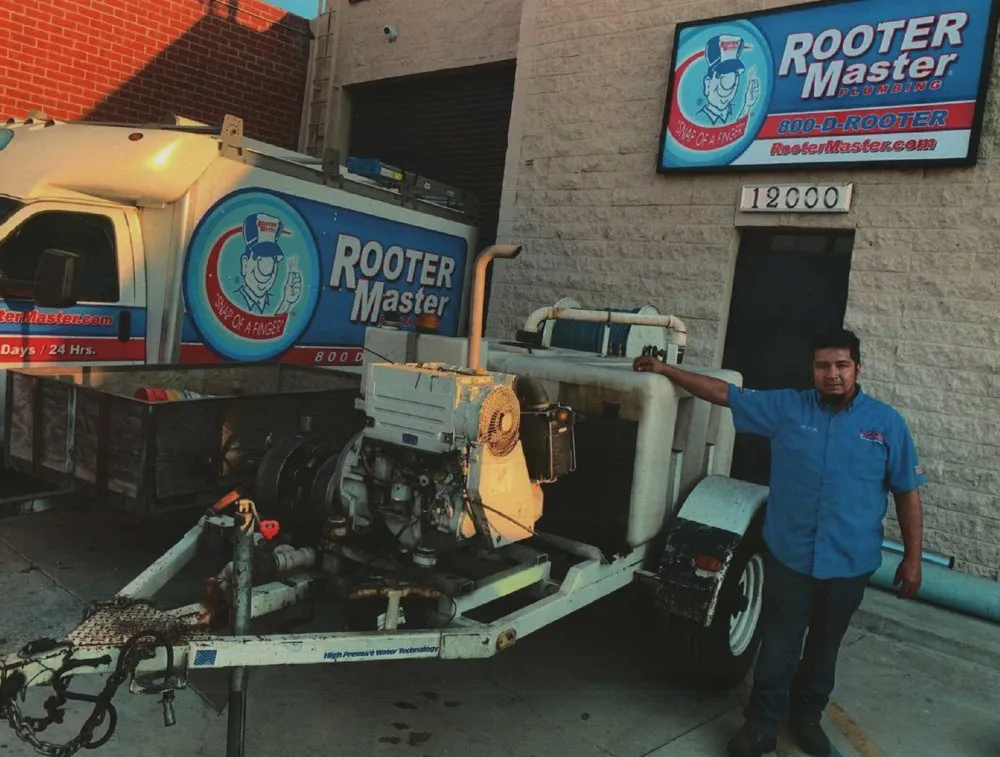 Slide of Rooter Master Plumbing