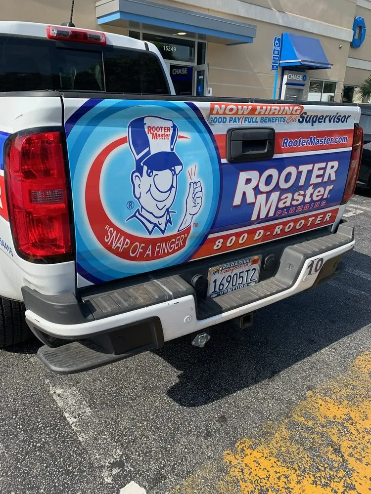 Slide of Rooter Master Plumbing