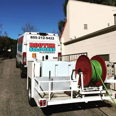 Rooter Solutions Plumbers Logo