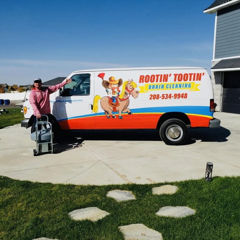 Slide of Rootin Tootin Drain Cleaning Services