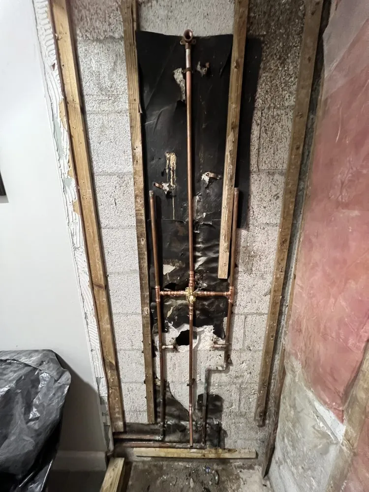 Slide of Royal Plumbing Service & Repair Team