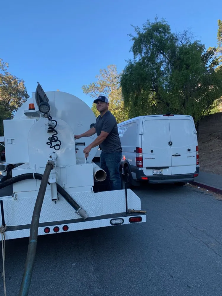 Slide of Roy's Sewer Service