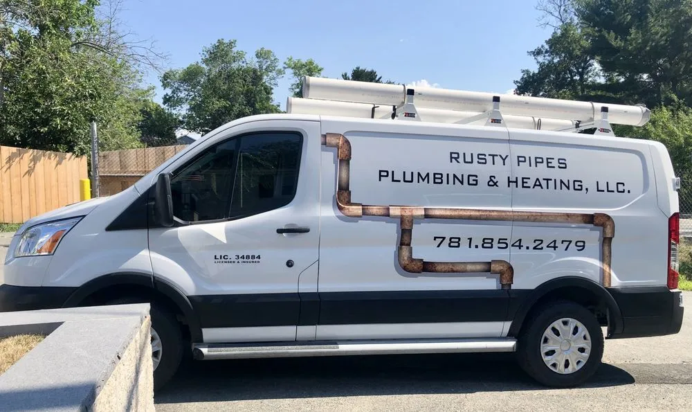 Slide of Rusty Pipes Plumbing & Heating