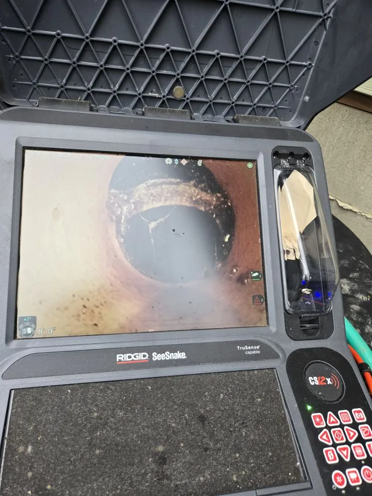 Slide of Sandy's Drain Cleaning