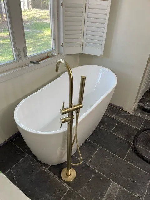 Slide of Schniddy Plumbing