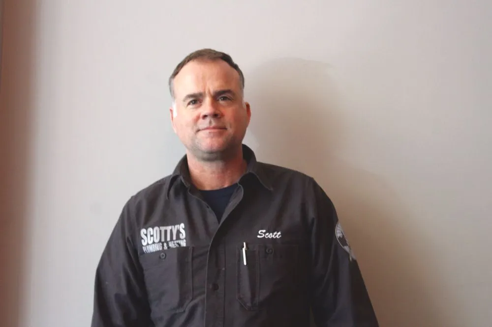 Slide of Scotty's Plumbing