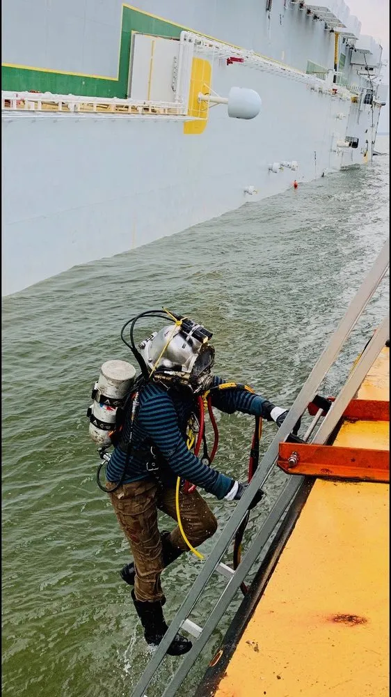 Slide of Sea Care Divers