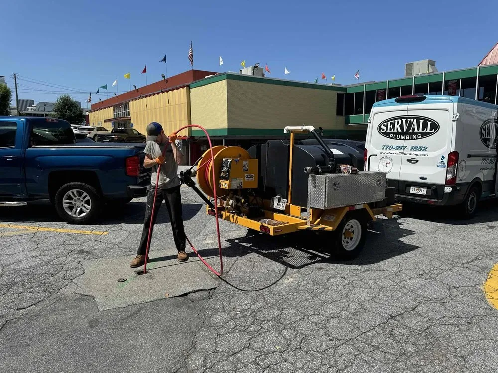 Slide of Serv'all Plumbing & Rooter Service