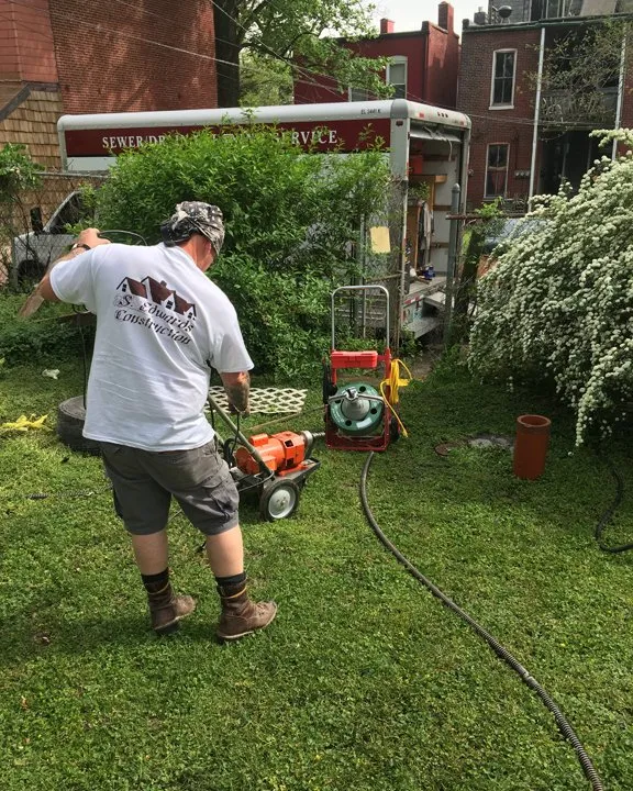 Slide of Sewer-Drain Cleaning Service