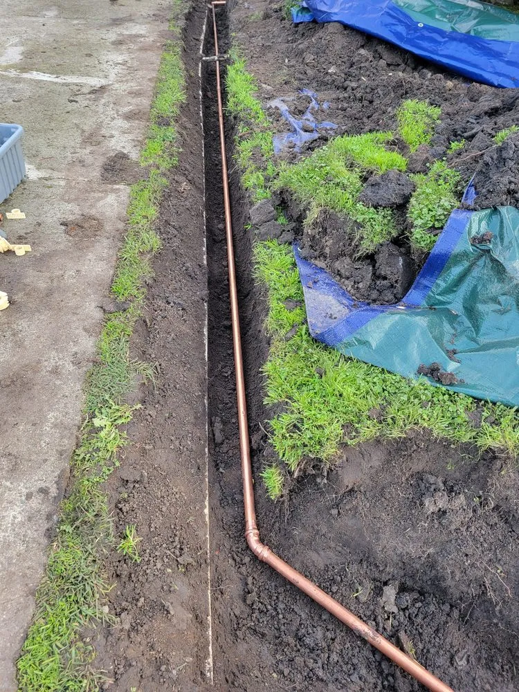 Slide of Sewer Man Plumbing & Rooter