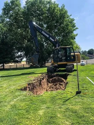 Shamrock Construction and Excavating Logo